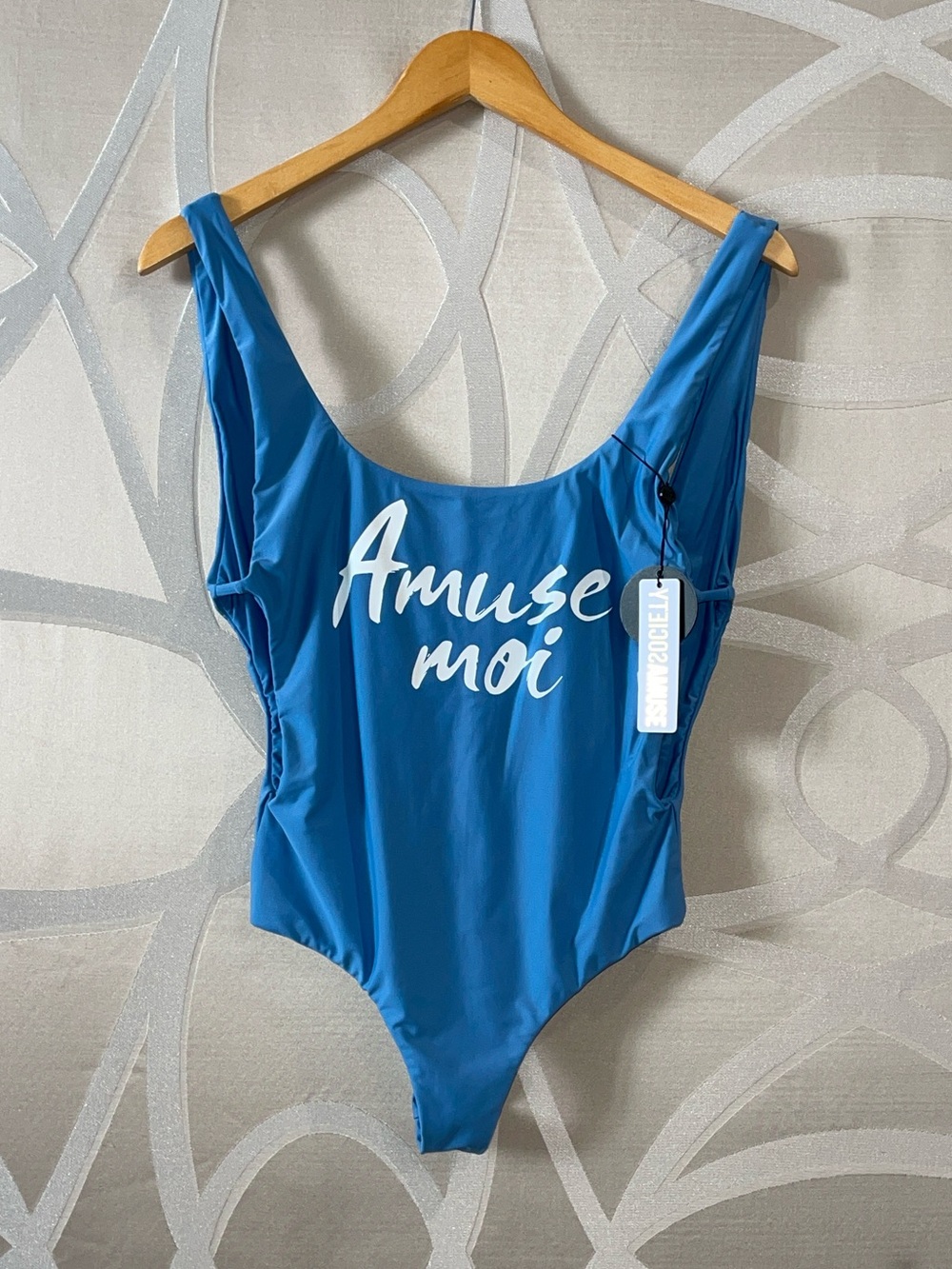 Amuse Society Sky Blue One-Piece with White Logo Tag “Amuse moi”